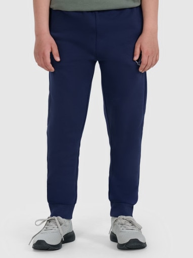 Chłopięce spodnie dresowe joggery 4F 4FJWAW25TTROM1258 - granatowe