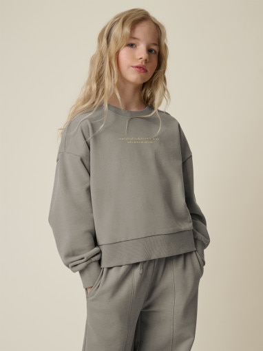  4F JUNIOR Dziewczęca bluza nierozpinana bez kaptura 4F 4FJRSS26TSWSF2813  szara Szary