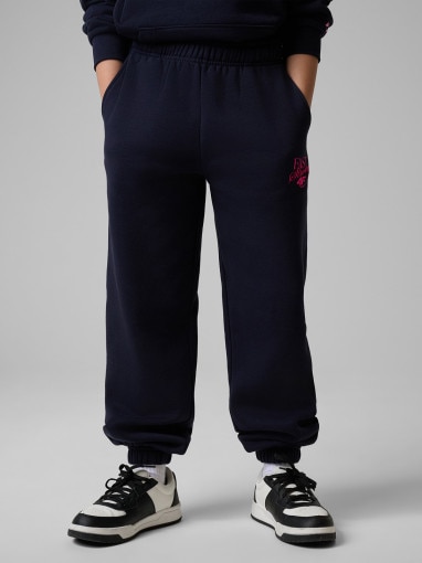 Dziewczęce spodnie dresowe 4F 4FJRSS26TTROF1878 - granatowe