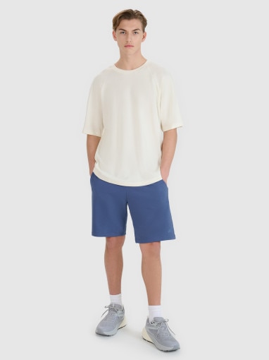  4F Męskie spodenki dresowe 4F 4FWMM00TSHOM543  niebieskie Niebieski