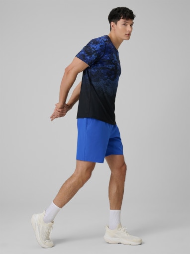  4F Męskie spodenki treningowe 4F 4FWSS26TFSHM1278  niebieskie Niebieski