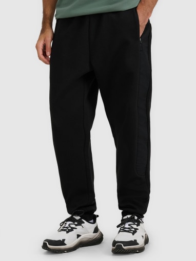 Męskie spodnie dresowe joggery 4F 4FWAW25TTROM1252 - czarne