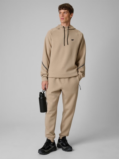  4F Męskie spodnie dresowe joggery 4F 4FWSS26TTROM1443  beżowe Beżowy
