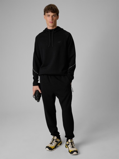  4F Męskie spodnie dresowe joggery 4F 4FWSS26TTROM1443  czarne Czarny