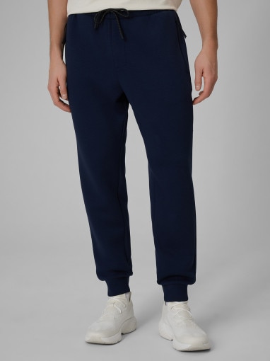 Męskie spodnie dresowe joggery 4F 4FWSS26TTROM1443 - granatowe