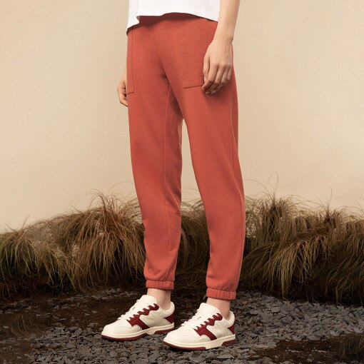 Damskie spodnie dresowe OUTHORN OTHAW22TTROF050 - czerwone