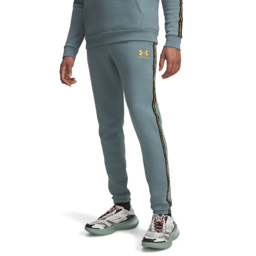 Męskie spodnie dresowe Under Armour UA Icon Fleece Jogger Taping - niebieskie