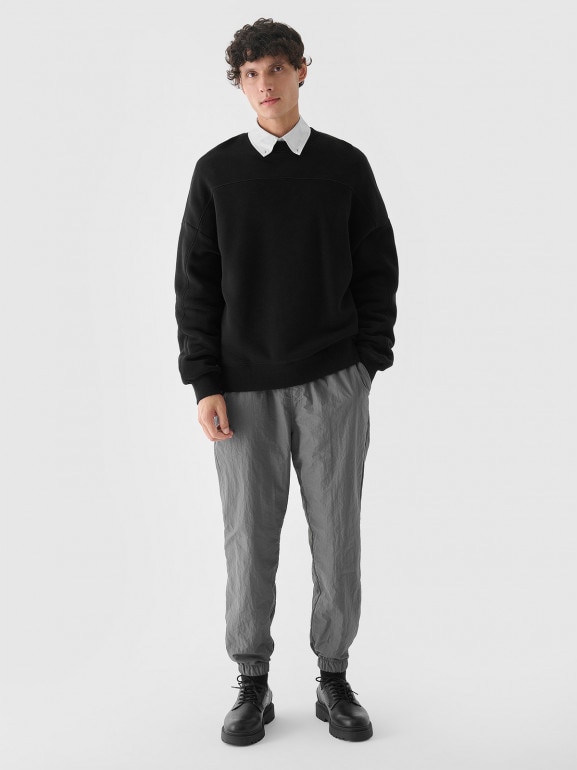 Męska bluza nierozpinana bez kaptura Outhorn OTHWAW24TSWSM1915 - czarna