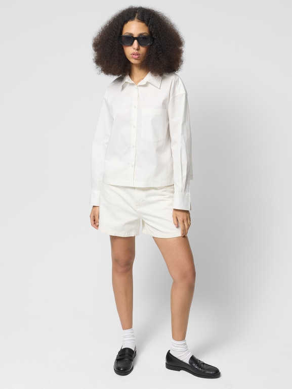 Damskie spodenki jeansowe Outhorn OTHWSS24TSHOF399 - beżowe