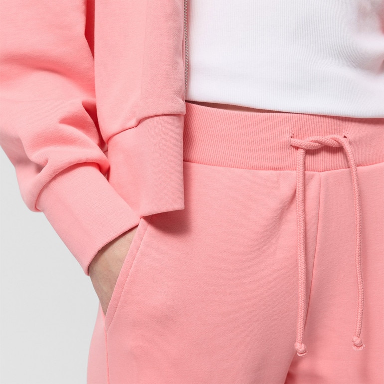 Damskie spodnie dresowe Outhorn OTHWSS24TTROF711 - różowe