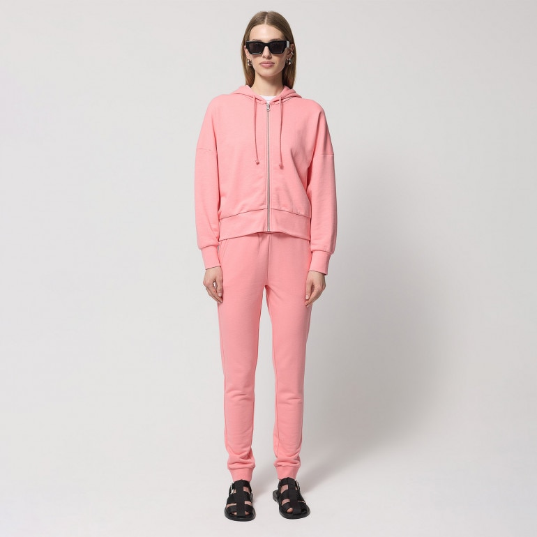 Damskie spodnie dresowe Outhorn OTHWSS24TTROF711 - różowe
