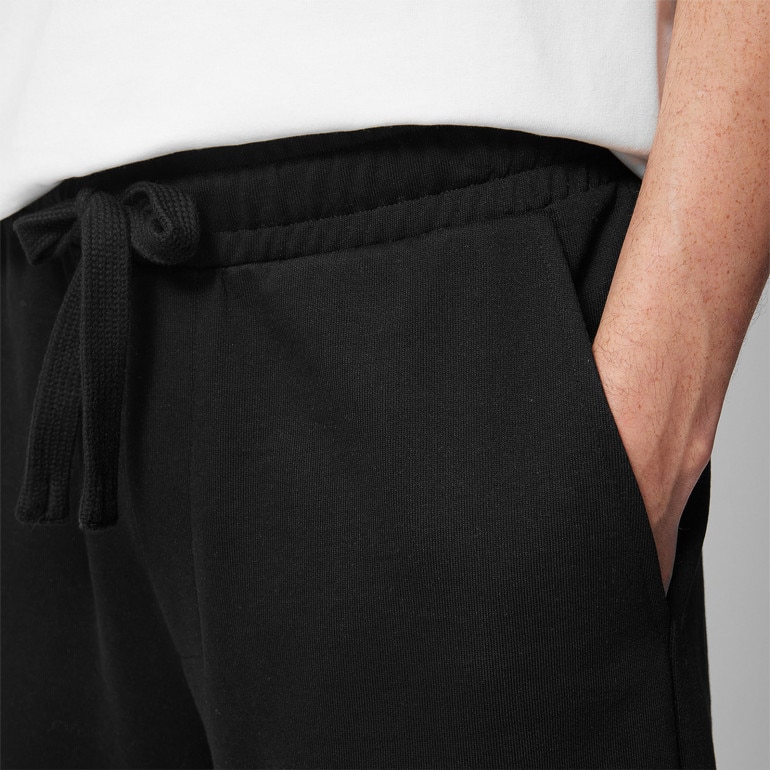 Męskie spodenki dresowe Outhorn OTHWSS24TSHOM389 - czarne