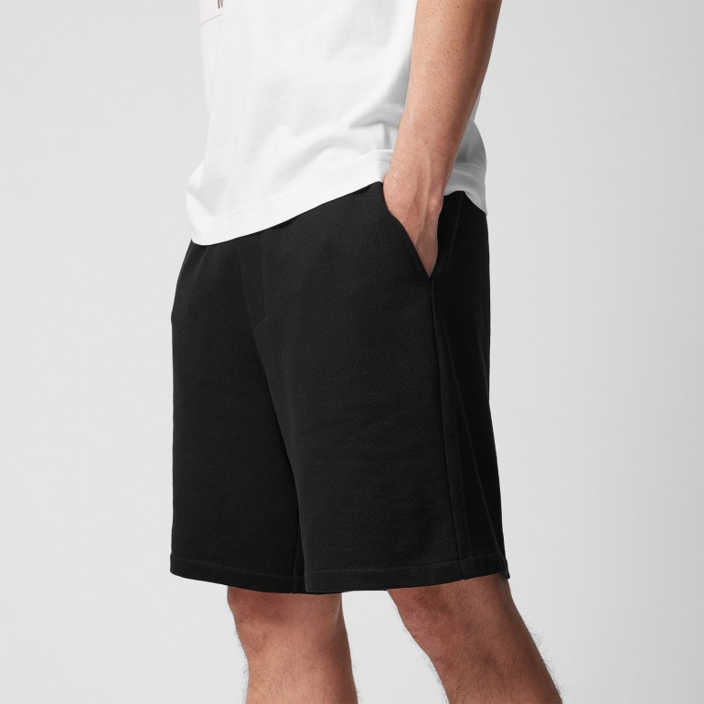 Męskie spodenki dresowe Outhorn OTHWSS24TSHOM389 - czarne