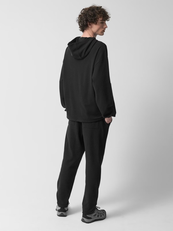 Męskie spodnie dzianinowe Outhorn OTHWSS24TTROM1050 - czarne