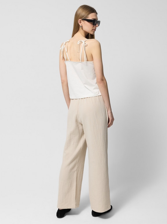 Damskie spodnie Outhorn OTHWSS24TTROF1017 - beżowe