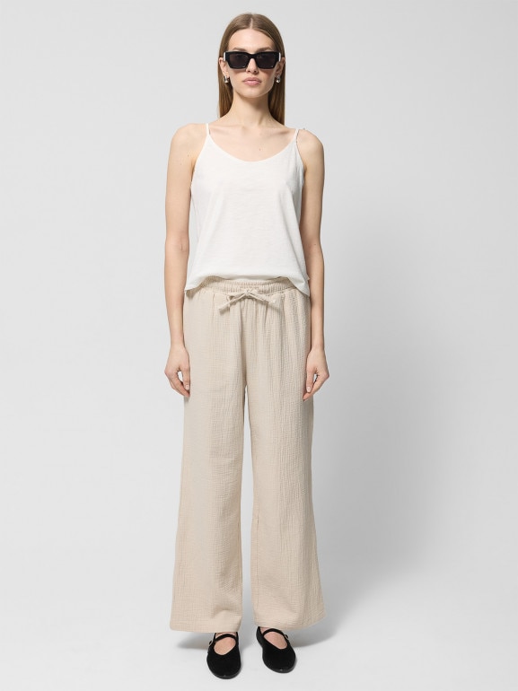 Damskie spodnie Outhorn OTHWSS24TTROF1017 - beżowe