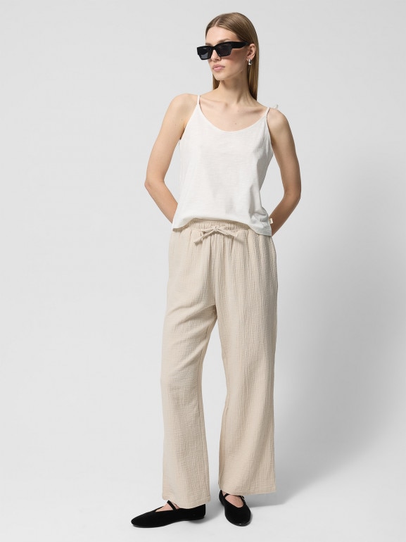 Damskie spodnie Outhorn OTHWSS24TTROF1017 - beżowe