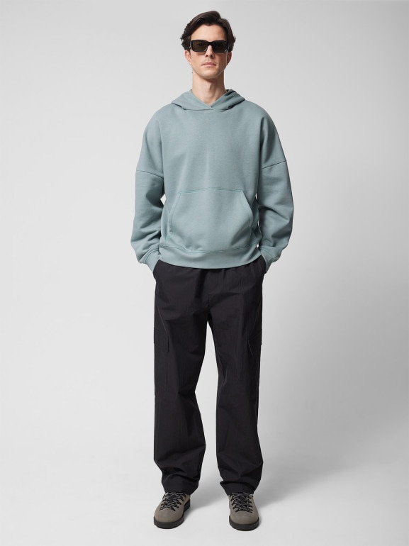 Męskie spodnie cargo Outhorn OTHWSS24TTROM637 - czarne