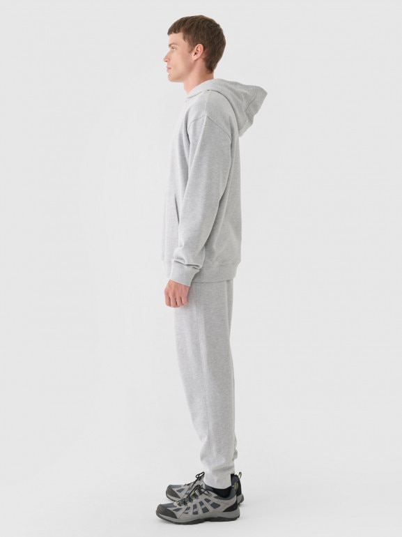 Męskie spodnie dresowe Outhorn OTHWAW24TTROM1090 - szare