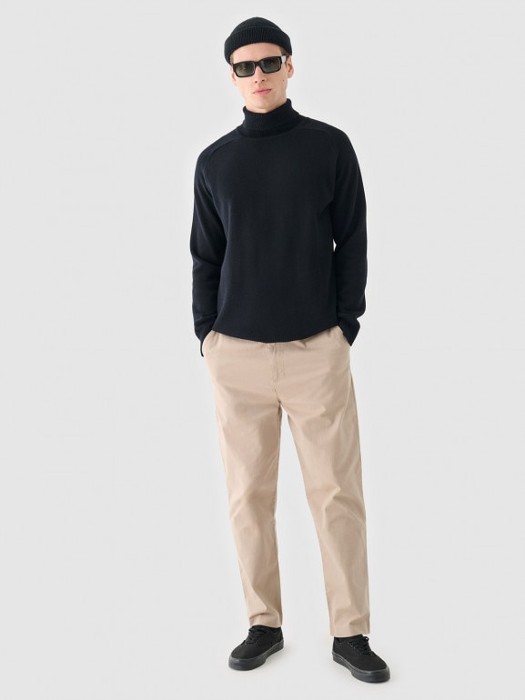 Męskie spodnie casual tkaninowe Outhorn OTHWAW24TTROM1075 - beżowe