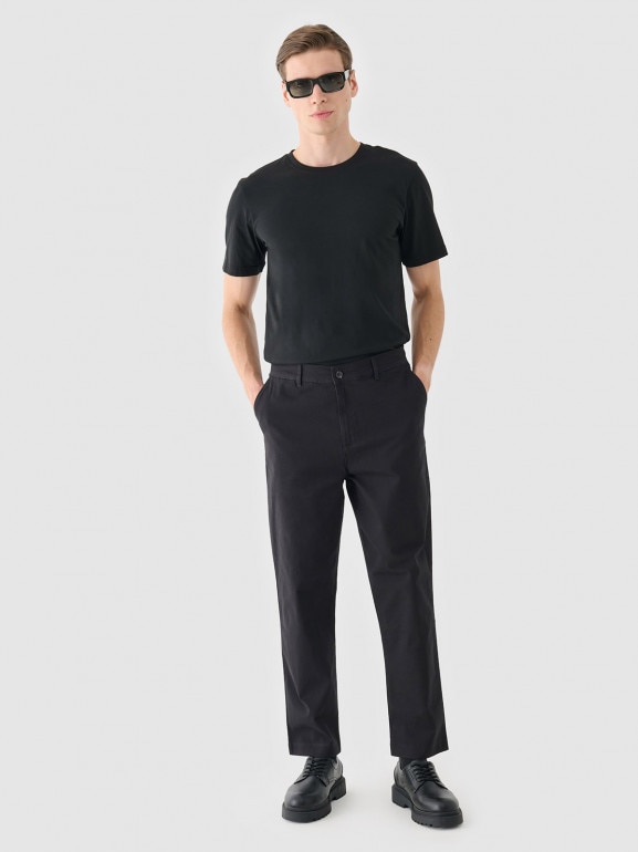 Męskie spodnie casual tkaninowe Outhorn OTHWAW24TTROM1075 - czarne