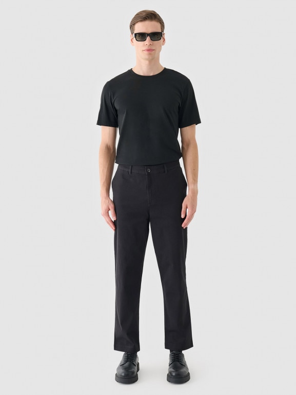 Męskie spodnie casual tkaninowe Outhorn OTHWAW24TTROM1075 - czarne