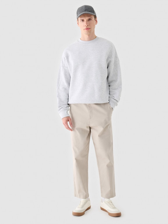 Męskie spodnie casual tkaninowe Outhorn OTHWAW24TTROM1089 - beżowe