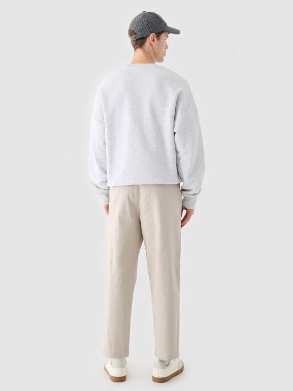 Męskie spodnie casual tkaninowe Outhorn OTHWAW24TTROM1089 - beżowe