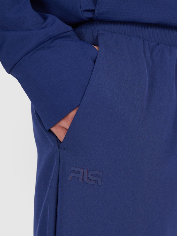 Męskie spodnie treningowe 4F x Robert Lewandowski RL9SSS25TFTRM1009 - granatowe