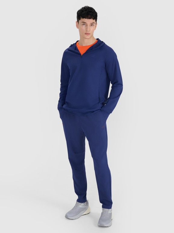 Męskie spodnie treningowe 4F x Robert Lewandowski RL9SSS25TFTRM1009 - granatowe