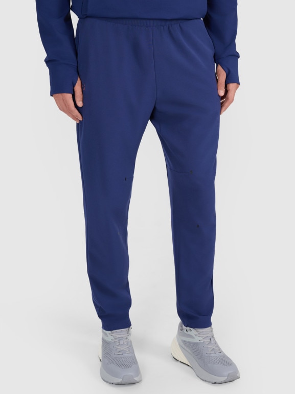 Męskie spodnie treningowe 4F x Robert Lewandowski RL9SSS25TFTRM1009 - granatowe