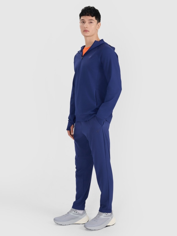 Męskie spodnie treningowe 4F x Robert Lewandowski RL9SSS25TFTRM1009 - granatowe