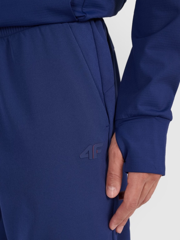 Męskie spodnie treningowe 4F x Robert Lewandowski RL9SSS25TFTRM1009 - granatowe