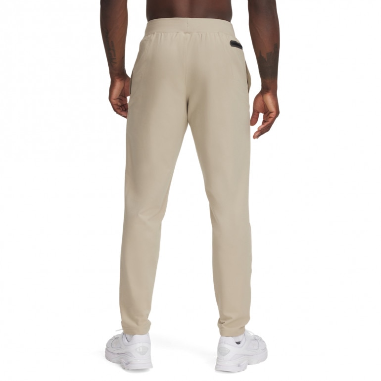 Męskie spodnie treningowe Under Armour UA Unstoppable Tapered Pants - beżowe