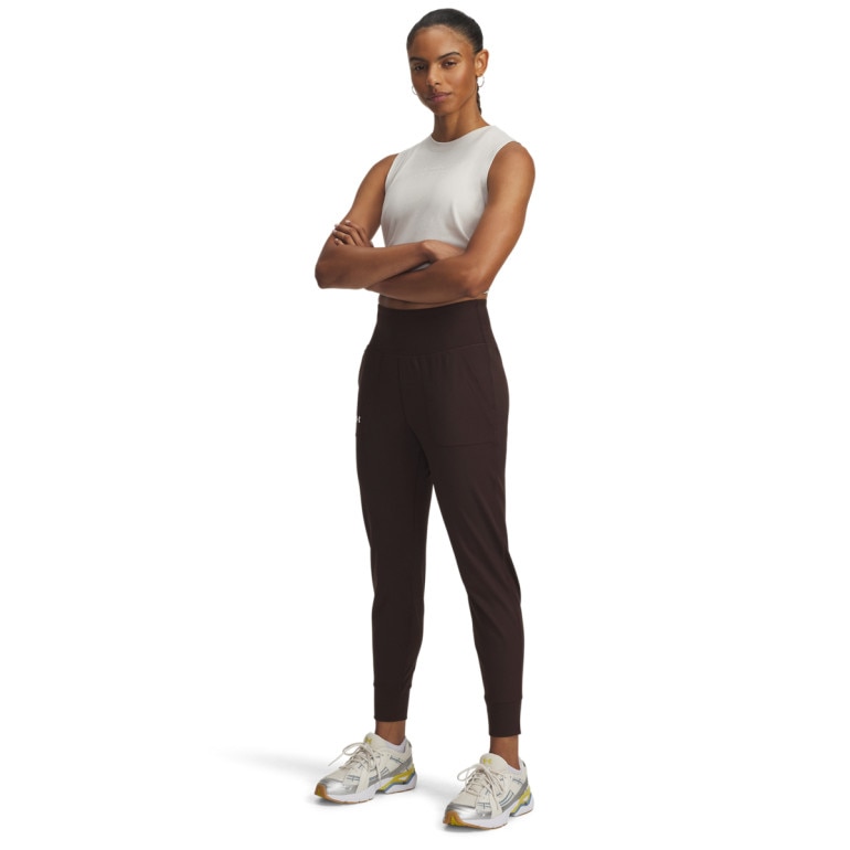 Damskie spodnie treningowe Under Armour Motion Jogger - brązowe