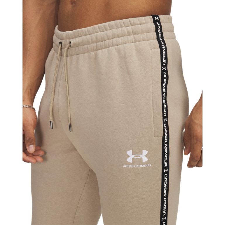 Męskie spodnie dresowe Under Armour UA Icon Fleece Jogger Taping - beżowe