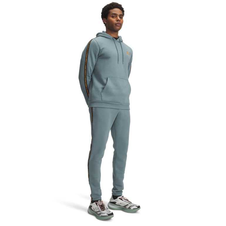 Męskie spodnie dresowe Under Armour UA Icon Fleece Jogger Taping - niebieskie