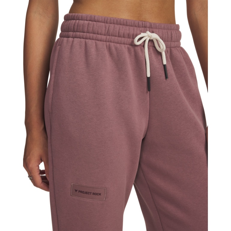 Damskie spodnie dresowe joggery Under Armour Project Rock Icon Pant - różowe