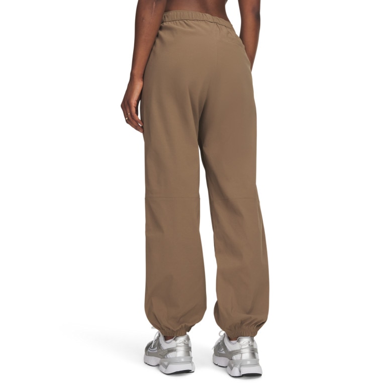 Damskie spodnie tkaninowe joggery Under Armour Unstoppable Wvn Jogger - brązowe