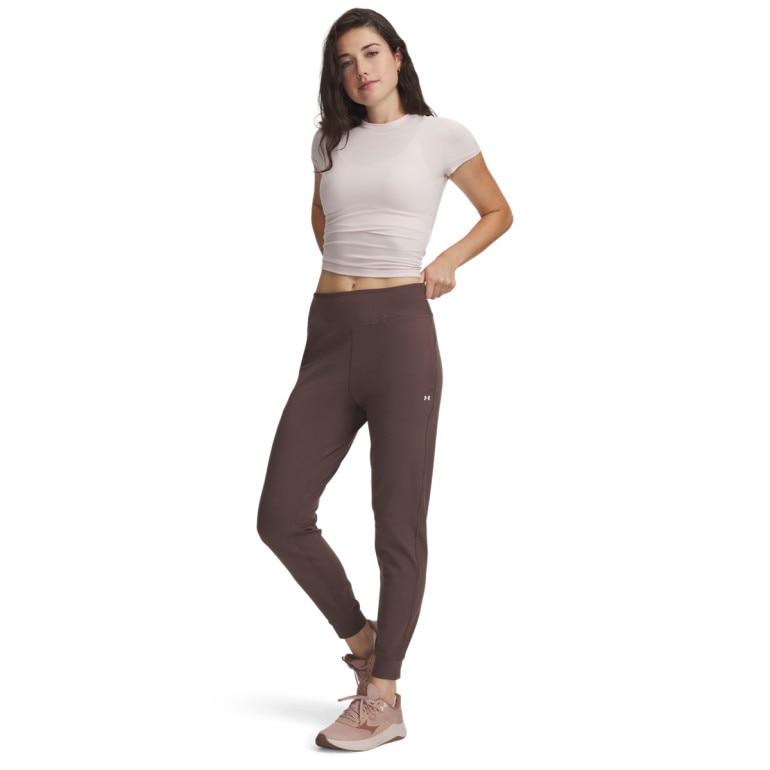 Damskie spodnie treningowe Under Armour Motion Jogger - brązowe