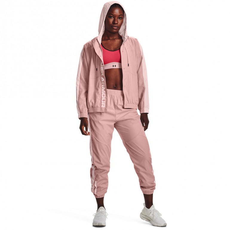 Damskie spodnie treningowe UNDER ARMOUR UA Rush Woven Pant - różowe