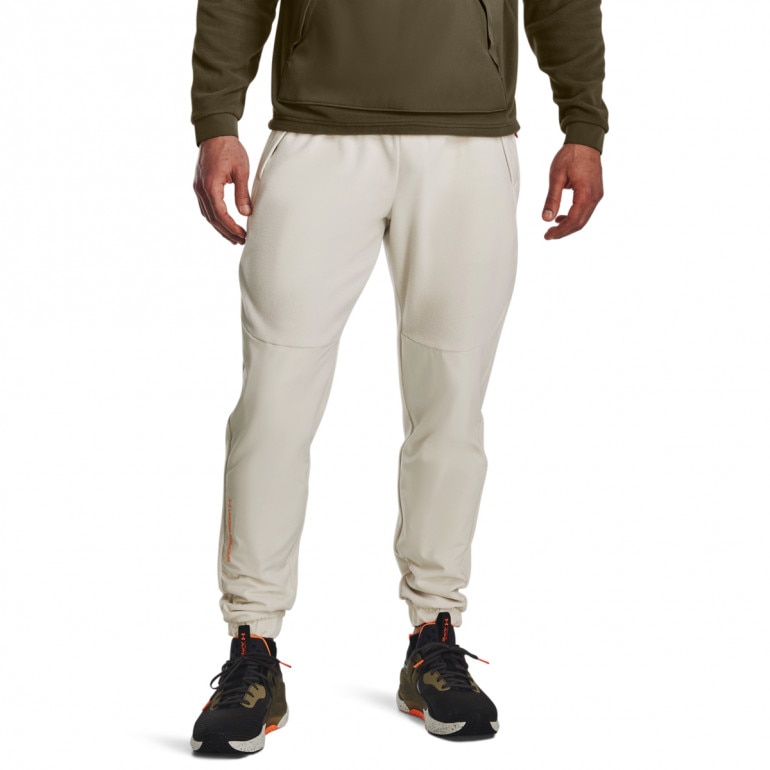 Męskie spodnie treningowe UNDER ARMOUR UA RUSH™ Fleece Pants - kremowe/ecru