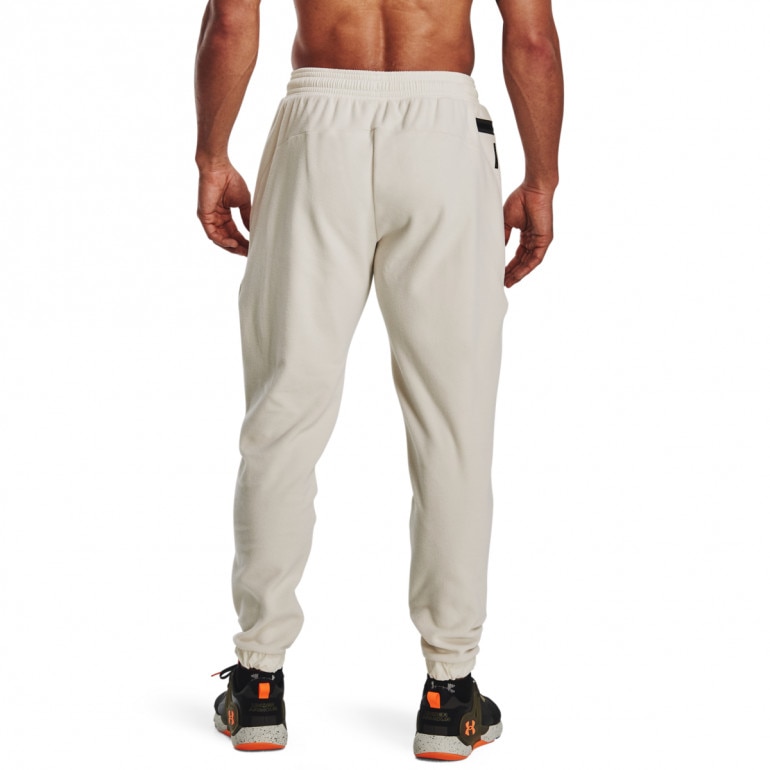 Męskie spodnie treningowe UNDER ARMOUR UA RUSH™ Fleece Pants - kremowe/ecru