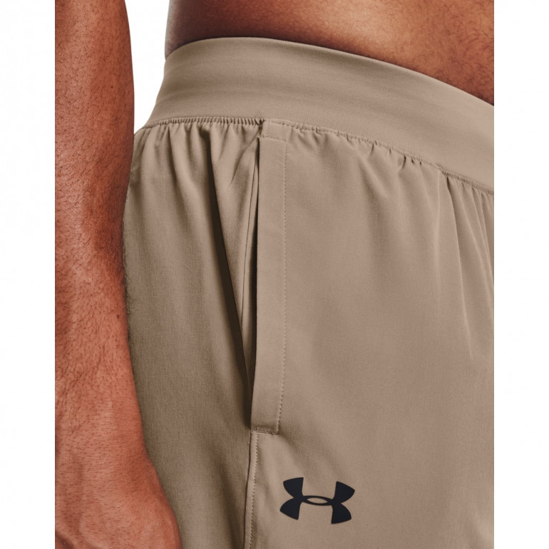 Męskie spodnie treningowe Under Armour UA Strech Woven Pant - beżowe