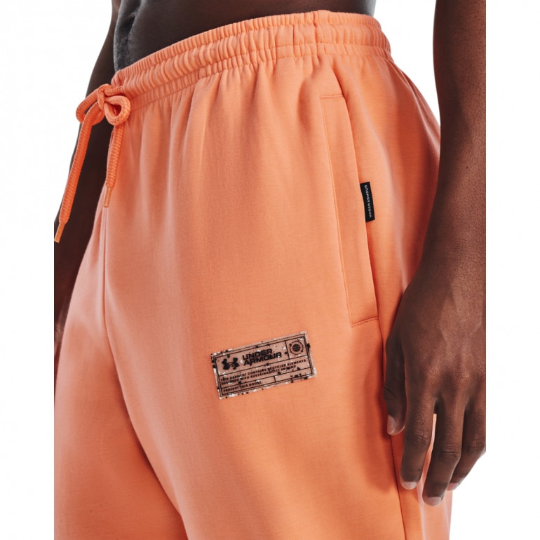 Spodnie treningowe uniseks Under Armour UA Summit Knit Joggers - pomarańczowe