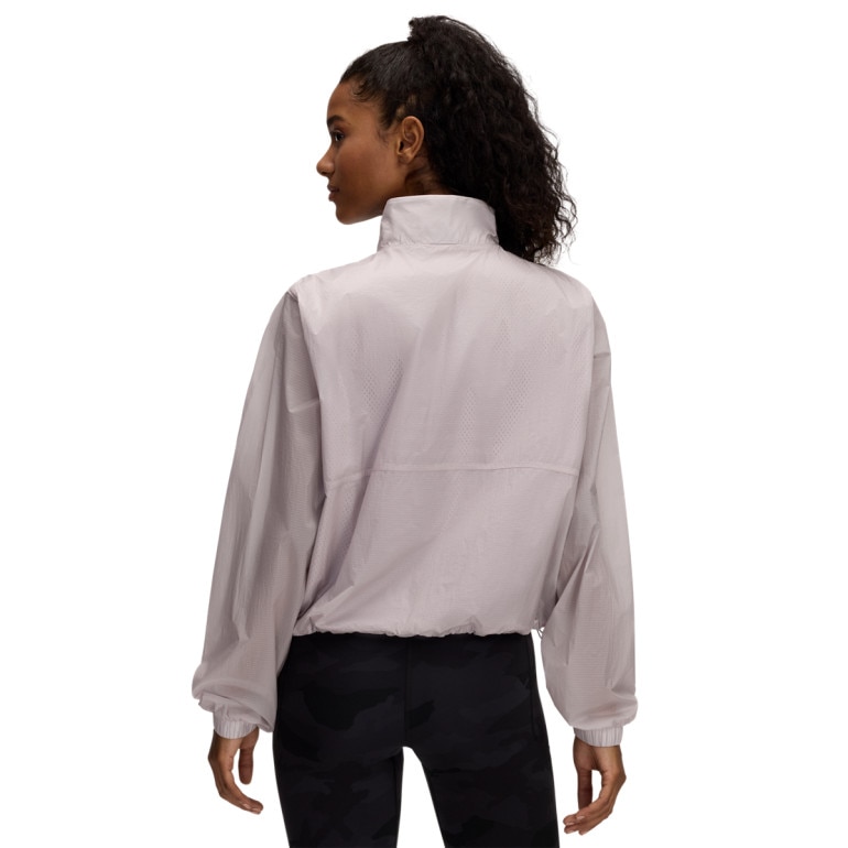 Damska kurtka treningowa Under Armour UA Rival Woven HZ Anorak - beżowa